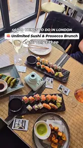 A short, aesthetic montage showcasing a bottomless sushi and prosecco brunch at Shiro Restaurant in London. The video features close-ups of various sushi rolls, sashimi, and gyoza, alongside the creator enjoying the meal and using an instant camera to capture the experience.