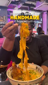 A short, punchy review of Belt Noodles in London, featuring close-ups of their signature wide handmade noodles, grilled skewers, and other dishes. The video captures the busy, casual atmosphere of the restaurant.
