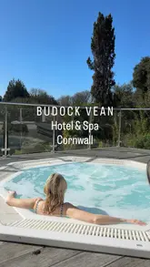 A montage-style tour of Budock Vean Hotel in Cornwall, showcasing the outdoor jacuzzi, indoor pool, hotel grounds, guest rooms, and leisure facilities like tennis and snooker.
