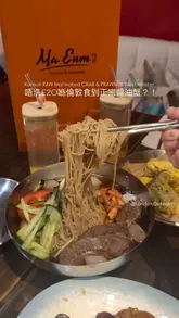 A short, punchy video showcasing a Korean meal featuring raw marinated crab, cold noodles, and a spicy soup at Ma Eum in Westminster. The video focuses on the food preparation and presentation, using close-up shots to highlight the textures and authenticity of the dishes.