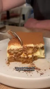 A couple visits Drip in Belfast to experience their evening menu, showcasing a variety of small plates, pasta dishes, desserts, and cocktails. The video highlights the venue's transition from a daytime coffee spot to an evening dining destination, emphasizing the quality and presentation of the food.
