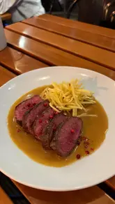 A montage-style reel showcasing a tasting menu at Bar Douro in London, featuring shots of the outdoor patio, the view of The Shard, and various Portuguese dishes and drinks.