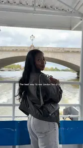 A montage video showcasing a scenic boat ride along the River Thames in London, highlighting the views of iconic landmarks from the water.