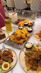 A fast-paced, visually appealing montage of various dishes at Chickaros in Coventry, featuring close-ups of food preparation and presentation, including dry ice effects and sauce pouring.