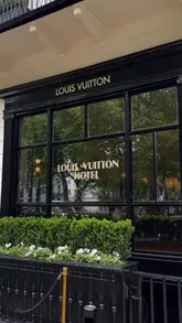 A short, aesthetic video showcasing the Louis Vuitton Hotel pop-up in London, featuring the interior decor, branded elements, and an afternoon tea service.