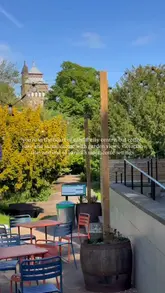 A short, aesthetic montage showcasing Brodies on the Wall, a cafe located in a historic Victorian lodge within Bute Park, Cardiff. The video highlights the interior decor, outdoor seating, coffee, and breakfast food options.