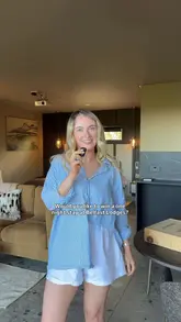 A promotional video for Belfast Lodges featuring a couple enjoying a luxury staycation. The video highlights the room amenities, including a private sauna, hot tub, projector screen for movie nights, and a cocktail-making kit, alongside a Chinese takeaway delivery.