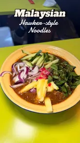 A review of 7 Floor Malaysia Tea Room in Holborn, London, featuring authentic Malaysian dishes like Curry Mee, Assam Laksa, and Chee Cheong Fun.