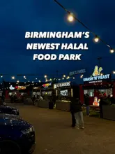 A wide-angle, evening shot of a newly opened halal food park in Birmingham, showcasing multiple food stalls illuminated by string lights. The image captures the atmosphere of the venue at night, with the text overlay clearly identifying the location.