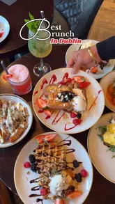 A promotional reel for Lemon & Duke in Dublin, featuring a variety of brunch dishes including waffles, French toast, eggs benedict, and cocktails. The video highlights the venue's interior, the bar service, and the overall brunch experience.