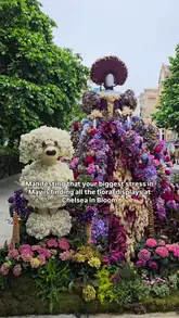 A short, aesthetic montage showcasing various floral art installations created for the 'Chelsea in Bloom' event in London. The video features a series of clips panning across different elaborate flower displays, set to music with text overlays providing context about the event.