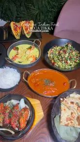 A montage of various Indian dishes and cocktails at Ticca Tikka in Shoreditch, featuring close-up shots of curries, tandoori chicken, and naan bread.