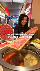 A vlog-style review of Da Long Yi Hot Pot in London, showcasing the ordering process via iPad, the DIY sauce station, and the hotpot dining experience with a focus on the one-metre beef and lamb platter.