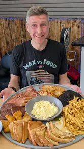 A competitive eater takes on the 'Super 6' breakfast challenge at O'Neills Cafe and Coffee Shop in Corby, featuring a massive platter of breakfast items. The video documents the challenge, audience interaction, and the final result.