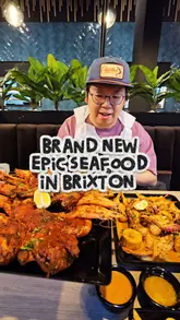 A high-energy review of Shrimp & Co. in Brixton, featuring the creator trying their signature seafood boil and massive sharing platters. The video highlights the messy, hands-on dining experience, showcasing the variety of seafood and grilled meats available.