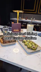 A montage-style video showcasing the interior, drinks, and various Indian dishes at Masakali restaurant near Euston Station. The video features smooth pans of the dining area, close-ups of the food and cocktails, and shots of the menu.