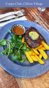 A family-focused review of a visit to Coppa Club, showcasing the interior, various dishes including starters, mains, and desserts, and the overall dining experience.