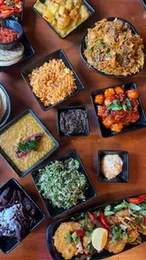 A vibrant review of The Coconut Island in Angel, London, highlighting the authentic Sri Lankan cuisine, creative cocktails, and lively atmosphere.