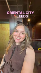 A vlog-style review of a Chinese restaurant in Leeds, featuring the creator trying various dishes including crispy duck and beef with Szechuan sauce.