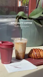 A short, aesthetic montage showcasing Mulliri cafe in South Kensington, featuring their specialty coffee, including Albanian Freddo, and a selection of fresh pastries.