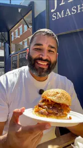 A review of James Smash Burgers, a street food pop-up in Southampton. The creator samples two burgers ('The Harold' and 'The Mighty Mike') and parmesan hot honey fries, providing a personal and enthusiastic critique of the food quality and the story behind the business.