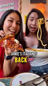 A group of friends visits the new Jamie's Italian flagship in London, reviewing various dishes including tiramisu, affogato, trout, pork milanese, and pizza. The video captures the lively atmosphere and the dining experience.