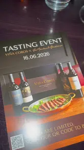 A recap video of a five-course tasting menu event at The Merchant Steakhouse, featuring wine pairings from Viña Cobos. The video showcases the venue, the menu, the wine bottles, and the plated dishes.
