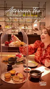 A promotional video showcasing the Tea Tales afternoon tea experience at Dim Sum Library in Covent Garden, highlighting the interactive dice-rolling element, the birdcage presentation, and the variety of dim sum and pastries served.