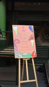 The video is a montage of an 'Evening of Seafood' event at Borough Market, featuring various seafood dishes from different vendors, live sea shanty music, and the general atmosphere of the market after hours.