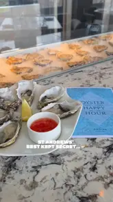 A creator visits Ondine Oyster & Grill in St Andrews to showcase their happy hour, featuring fresh oysters, champagne, and sea views.