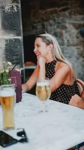 A montage video showcasing the interior, cocktails, and food offerings of The Charleston in Bakewell. The video features slow, cinematic pans of the dining area, bar, and various dishes, highlighting the venue's glamorous aesthetic.