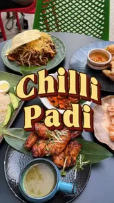 A short, energetic reel showcasing a variety of Malaysian dishes at Chilli Padi in Stratford, including Nasi Lemak, Kway Teow, and Roti Canai, with close-ups of the food and brief glimpses of the venue's interior and outdoor seating.