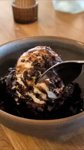 A short, punchy video showcasing a selection of vegan dishes at Shrub in Chester, including artichoke wings, a house burger, Sichuan fries, and a chocolate brownie.