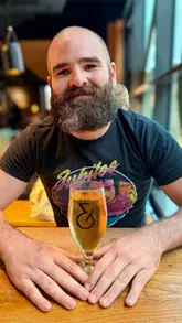 A vlog-style review of a visit to Bonnie & Wild, a food market in Edinburgh, focusing on the new Thistly Cross cider bar and various food vendors including Chooks and Kochchi.