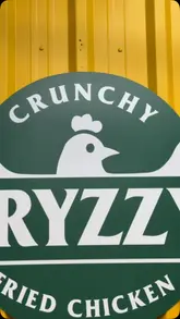 A fast-paced video showcasing the menu at Fryzzy, a fried chicken takeaway in Tottenham, featuring close-ups of their signature broasted chicken, burgers, wings, and milkshakes.