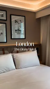 A short, aesthetic tour of a boutique hotel room in London, highlighting the modern, app-based check-in process and the room's amenities.