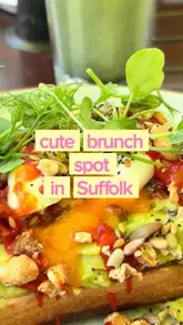 A short, engaging reel showcasing a brunch visit to Maeve's in Woodbridge, Suffolk. The video highlights the cafe's outdoor garden seating, the variety of cakes available at the counter, and specific brunch dishes like avocado toast and matcha lattes.