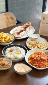 A promotional reel featuring The Yards in Covent Garden, highlighting the Mediterranean-inspired decor and dining options at Olea Social, along with a gelato pop-up.
