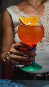 A visually appealing reel showcasing a cocktail bar in Haggerston that functions as a laboratory, featuring shots of drink preparation, equipment, and the final cocktails.