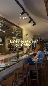 A vibrant, fast-paced review of a Filipino restaurant called Belly, highlighting a £24 meal deal that includes a cod pandesal sandwich, beef fat fries, and a pandan & coconut cooler. The video also showcases additional dishes like beef tartare, steak, seafood caldereta, and ube tiramisu.