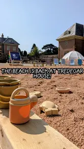 A montage of a child enjoying the 'Summer of Play' event at Tredegar House, featuring a sandpit, water play, role-play huts, and a Pokémon trail.