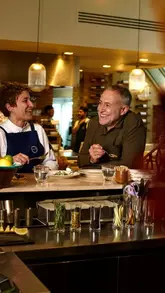 Michel Roux Jr. takes viewers on a curated tour of his favorite London food spots, including La Fromagerie, Miel bakery, Sabor, and Trinity. The video features high-quality cinematography, interviews with the chefs, and close-ups of the food, providing an insider's look at the city's culinary scene.