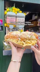 A short, engaging reel showcasing a street food stall in Camden Market, featuring the preparation and consumption of Italian-style wraps and mozzarella sticks.