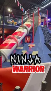 A video showcasing a child navigating the obstacle course at Ninja Warrior UK, highlighting the various physical challenges available.
