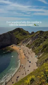 A high-angle, scenic landscape photograph of the Jurassic Coast, capturing the dramatic cliffs, beach, and sea. The image is bright, well-composed, and effectively highlights the natural beauty of the location, serving as an inviting travel visual.