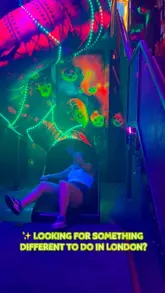 A promotional video for NQ64, an arcade bar, showcasing the neon-lit atmosphere, retro gaming machines, and signature cocktails.