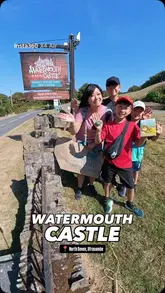 A family-focused vlog showcasing a day out at Watermouth Castle in North Devon. The video features a montage of various attractions, including castle exhibits, a dungeon, a maze, slides, and marble runs, highlighting the quirky and fun nature of the venue for families.