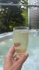 A montage video showcasing a log cabin stay in North Wales, featuring views of the River Dee, the cabin interior, and a hot tub experience.