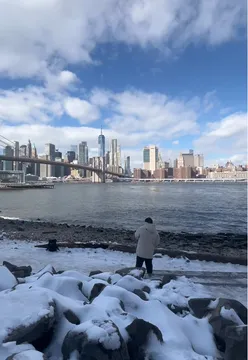 Person sharing tips for budget-friendly hotel stays with travel accessories and visuals in the background.