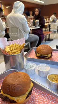 Delicious beef burger at a food spot in London, rated 10/10 for taste and presentation.